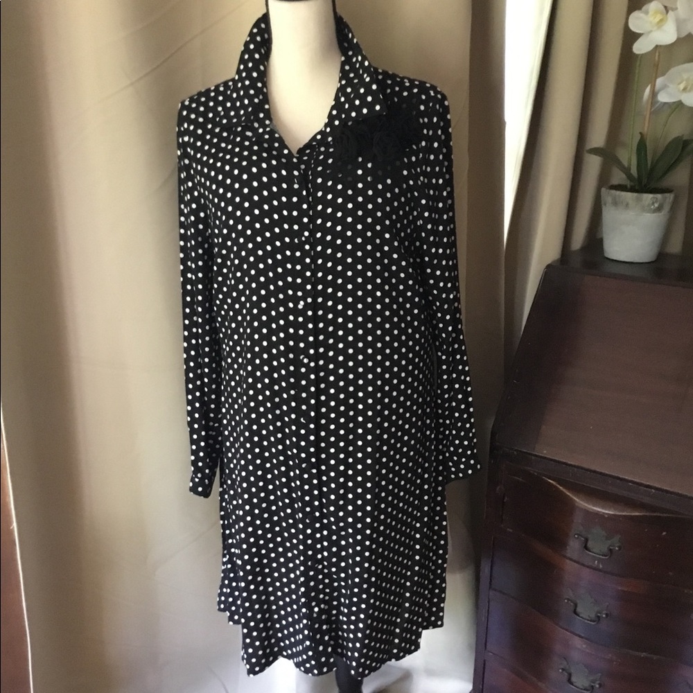 Polka Dot Dress with  Flower detail on shoulder.